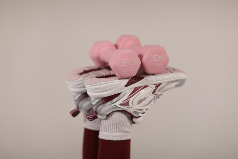 Grip socks and pink Pilates weights